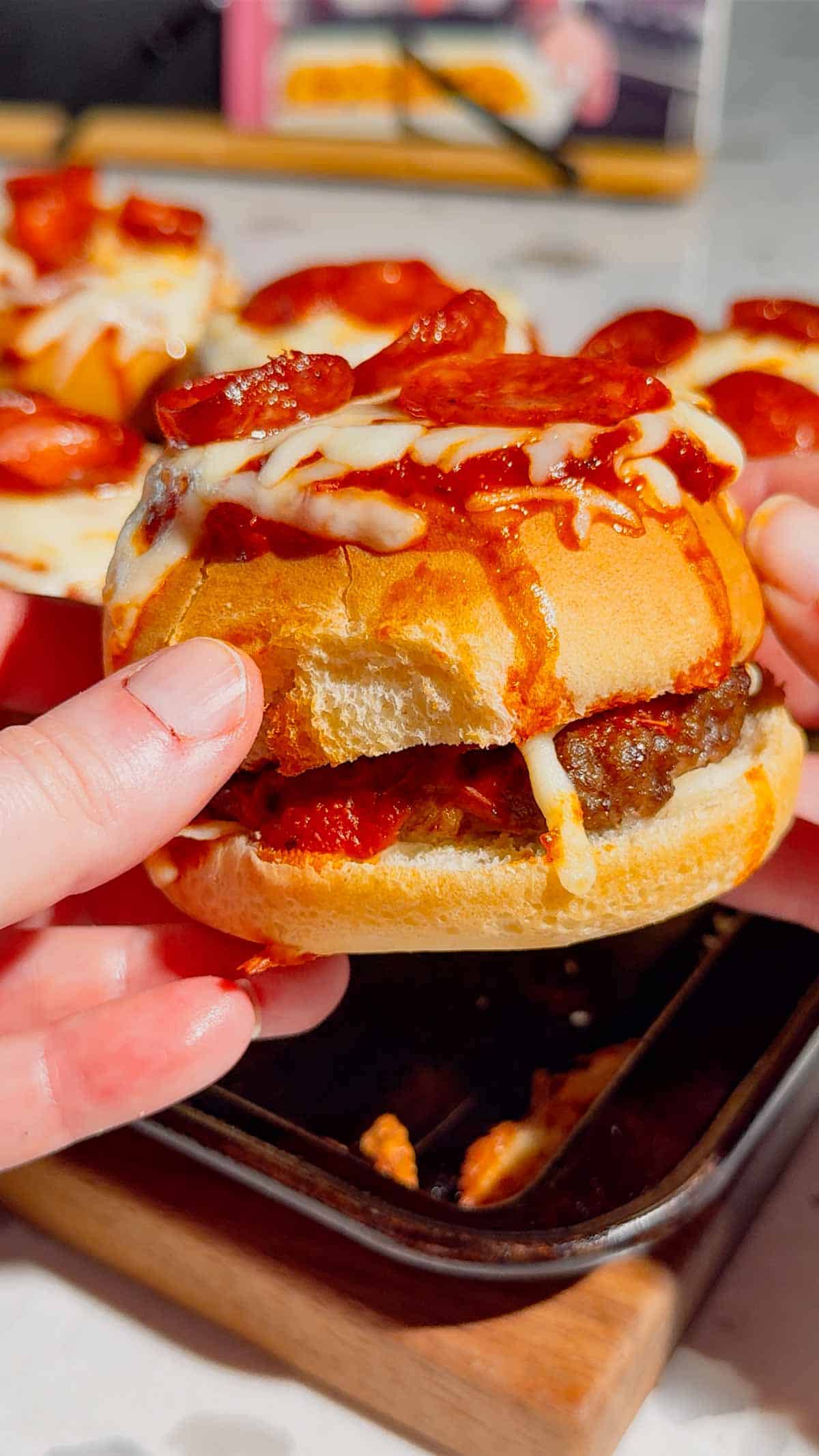 Looking for the ultimate Pizza Burgers recipe? These easy Pizza Burger sandwiches combine juicy seasoned ground beef, gooey mozzarella cheese, pizza sauce, pepperoni, and soft hamburger buns for the perfect family-friendly dinner. If you love Pizza Burger Recipes, Easy Ground Beef Recipes, Weeknight Dinner Ideas, Pizza Sloppy Joes, Cheeseburger Recipes, Pizza Sandwiches, Easy Dinner Recipes For Family, Quick Dinner Ideas, Ground Beef Dinner Recipes, Comfort Food Recipes, Baked Burgers, and fun Pizza Night Ideas, this recipe belongs on your menu. Ready in just 35 minutes with simple ingredients, these cheesy oven-baked burgers are perfect for busy weeknights, game day, parties, or whenever you're craving the flavors of pizza and burgers in one irresistible meal.