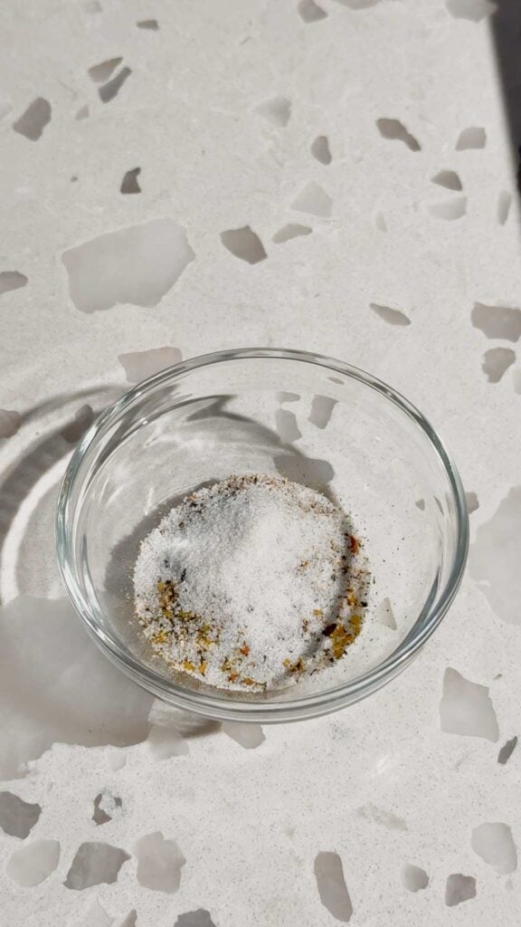 salt, pepper, garlic powder and Italian seasoning in a small glass bowl