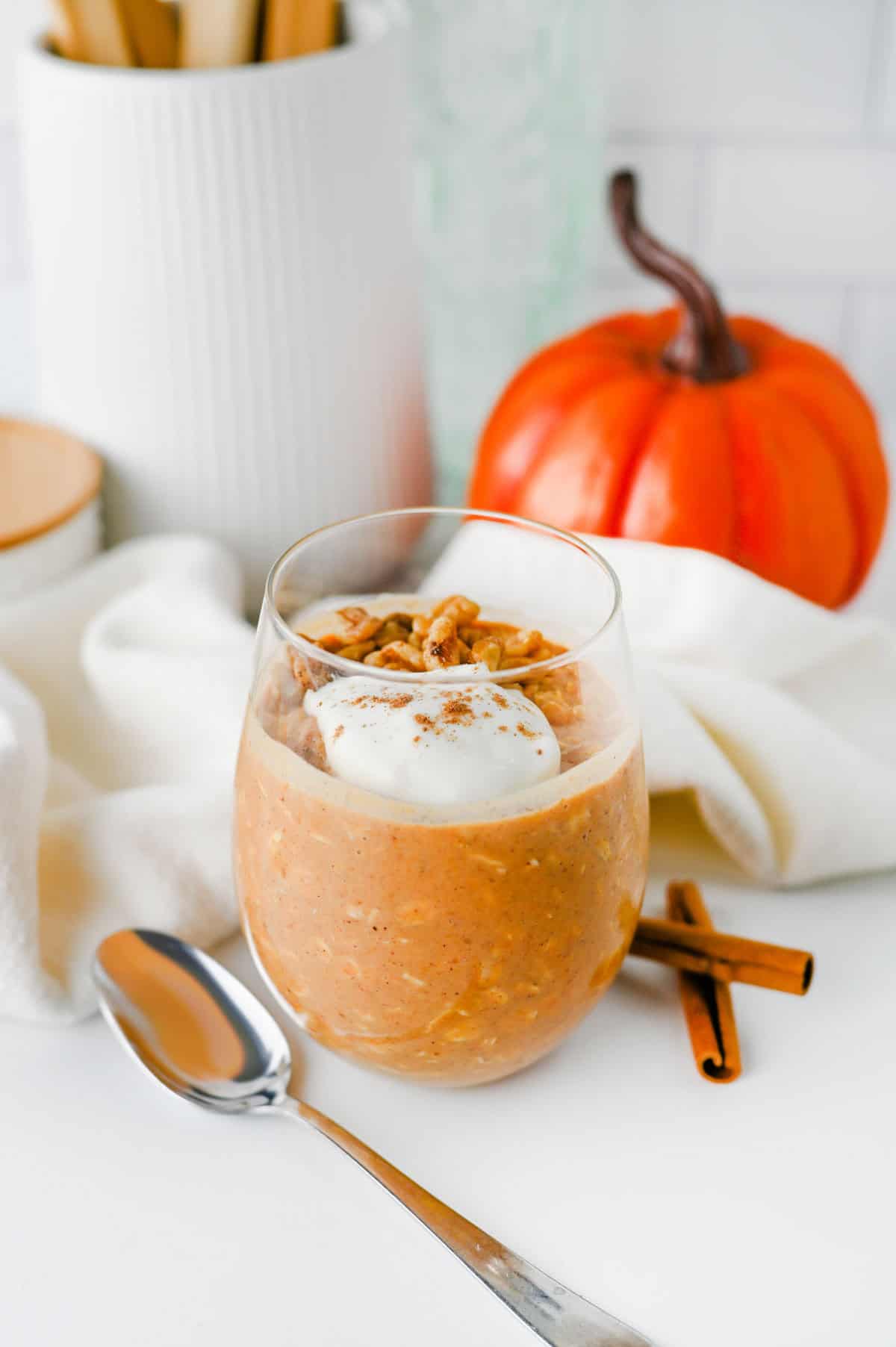 Looking for an easy, healthy breakfast that tastes like fall? These Pumpkin Overnight Oats are creamy, satisfying, and packed with cozy pumpkin pie spice, real pumpkin puree, protein powder, and hearty old fashioned oats for the perfect make-ahead meal. This Pumpkin Overnight Oats Recipe is ideal for meal prep, busy mornings, and anyone searching for high protein overnight oats, healthy pumpkin breakfast ideas, fall breakfast recipes, pumpkin oatmeal, or easy overnight oats with pumpkin puree. Top with vanilla Greek yogurt, nuts, chocolate chips, or maple syrup for a customizable breakfast that's filling, delicious, and ready to grab straight from the fridge all week long.