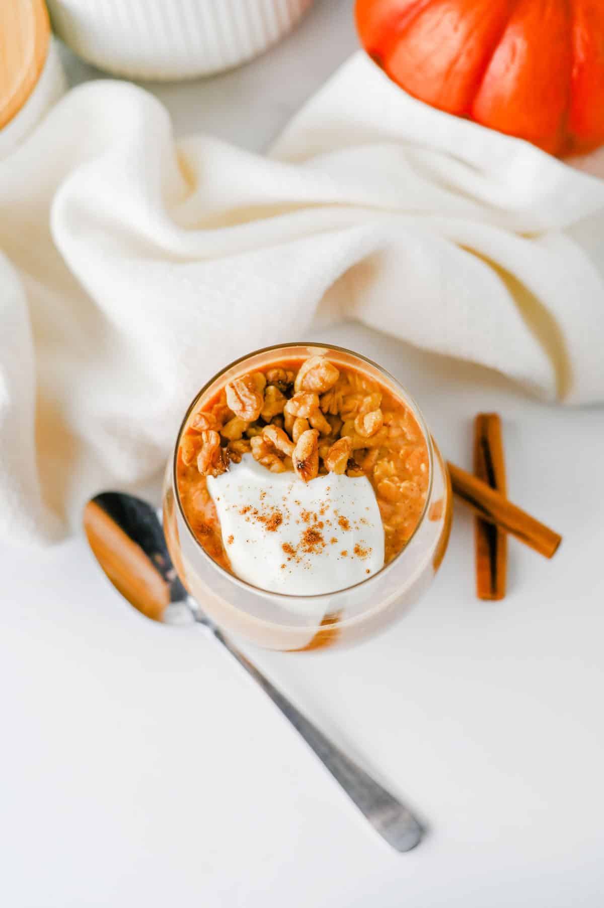 Looking for an easy, healthy breakfast that tastes like fall? These Pumpkin Overnight Oats are creamy, satisfying, and packed with cozy pumpkin pie spice, real pumpkin puree, protein powder, and hearty old fashioned oats for the perfect make-ahead meal. This Pumpkin Overnight Oats Recipe is ideal for meal prep, busy mornings, and anyone searching for high protein overnight oats, healthy pumpkin breakfast ideas, fall breakfast recipes, pumpkin oatmeal, or easy overnight oats with pumpkin puree. Top with vanilla Greek yogurt, nuts, chocolate chips, or maple syrup for a customizable breakfast that's filling, delicious, and ready to grab straight from the fridge all week long.