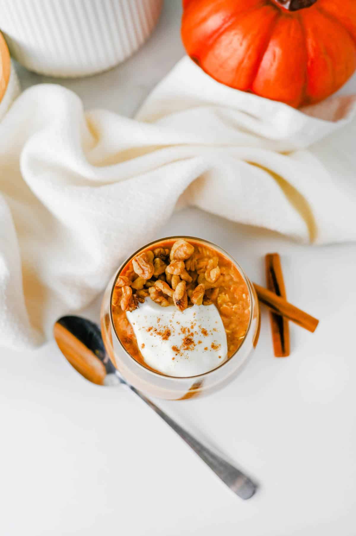 Looking for an easy, healthy breakfast that tastes like fall? These Pumpkin Overnight Oats are creamy, satisfying, and packed with cozy pumpkin pie spice, real pumpkin puree, protein powder, and hearty old fashioned oats for the perfect make-ahead meal. This Pumpkin Overnight Oats Recipe is ideal for meal prep, busy mornings, and anyone searching for high protein overnight oats, healthy pumpkin breakfast ideas, fall breakfast recipes, pumpkin oatmeal, or easy overnight oats with pumpkin puree. Top with vanilla Greek yogurt, nuts, chocolate chips, or maple syrup for a customizable breakfast that's filling, delicious, and ready to grab straight from the fridge all week long.