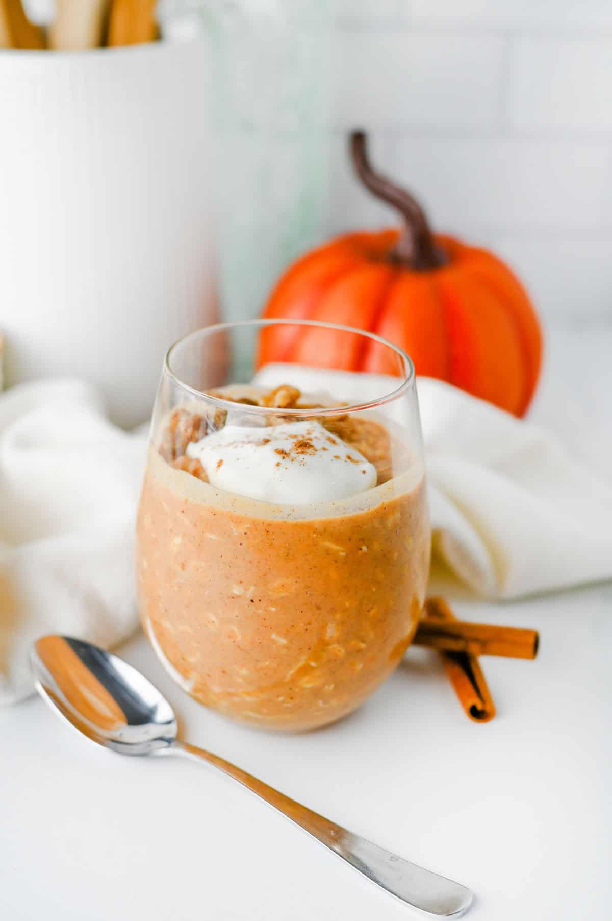 Looking for an easy, healthy breakfast that tastes like fall? These Pumpkin Overnight Oats are creamy, satisfying, and packed with cozy pumpkin pie spice, real pumpkin puree, protein powder, and hearty old fashioned oats for the perfect make-ahead meal. This Pumpkin Overnight Oats Recipe is ideal for meal prep, busy mornings, and anyone searching for high protein overnight oats, healthy pumpkin breakfast ideas, fall breakfast recipes, pumpkin oatmeal, or easy overnight oats with pumpkin puree. Top with vanilla Greek yogurt, nuts, chocolate chips, or maple syrup for a customizable breakfast that's filling, delicious, and ready to grab straight from the fridge all week long.
