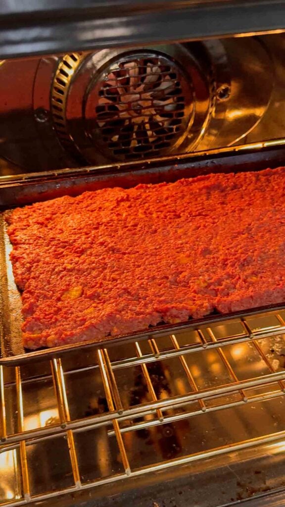 raw sheet pan meatloaf in the oven