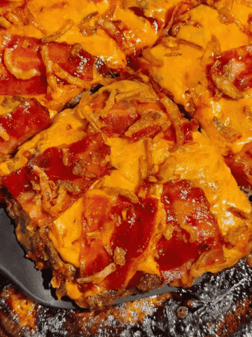 Looking for the ultimate Sheet Pan BBQ Bacon Cheeseburger Meatloaf recipe? This easy family dinner combines juicy ground beef, smoky BBQ sauce, crispy bacon, melty cheddar cheese, and crunchy fried onions for a comfort food meal everyone will love. If you're searching for Sheet Pan Dinners, Easy Meatloaf Recipes, Ground Beef Dinner Ideas, Weeknight Dinner Ideas, Family Dinner Recipes, Cheeseburger Meatloaf, BBQ Meatloaf Recipe, Easy Ground Beef Recipes, Comfort Food Dinners, Sheet Pan Meals, or Quick Dinner Recipes, this crowd-pleasing recipe belongs on your menu. Ready in just 45 minutes with simple ingredients, it's perfect for busy nights, meal planning, potlucks, or whenever you're craving a cheesy, bacon-loaded dinner the whole family will request again and again.