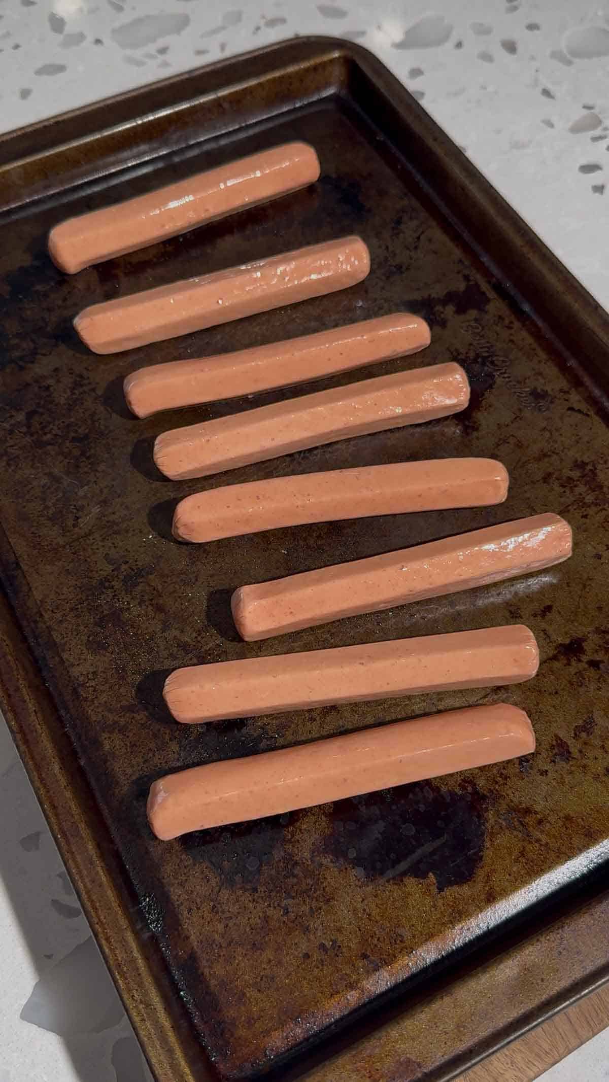 wieners on a baking sheet