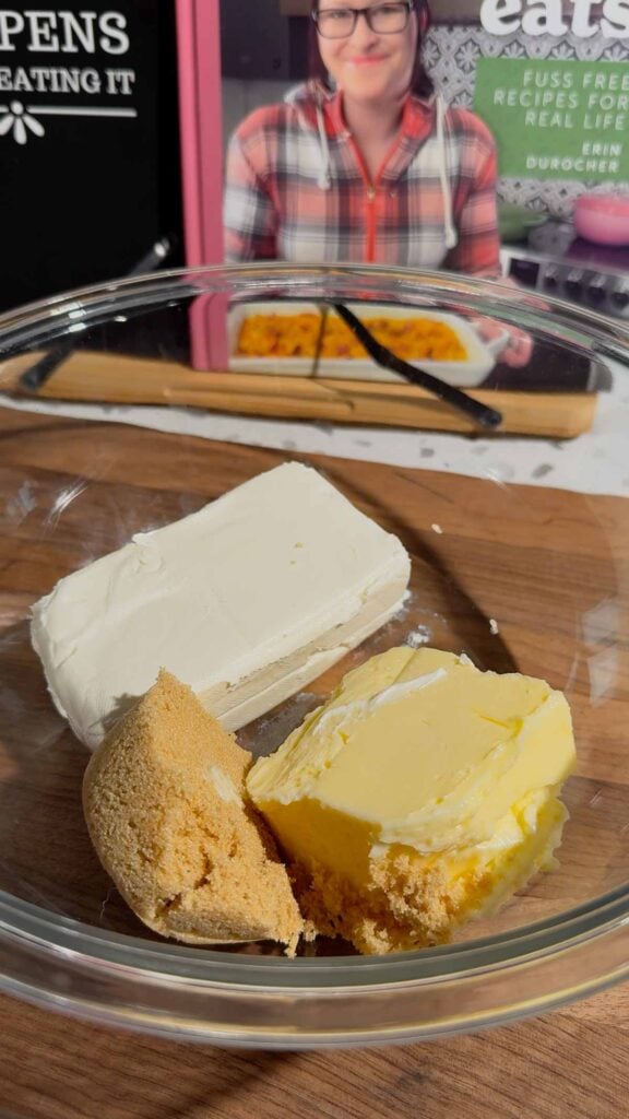 brown sugar, cream cheese and butter in a glass mixing bowl