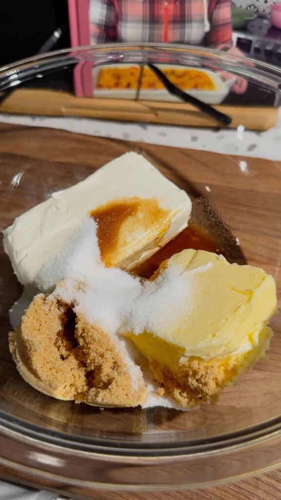 vanilla extract, salt, sugar, brown sugar, butter and cream cheese in a glass bowl