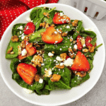 Looking for a fresh and easy salad recipe everyone will love? This Strawberry Spinach Salad is loaded with baby spinach, juicy fresh strawberries, crunchy walnuts, and creamy feta cheese, all tossed in a simple homemade balsamic dressing. It's the perfect healthy salad for spring and summer, whether you need a quick lunch, light dinner, side dish, picnic recipe, or potluck favorite. This easy spinach salad comes together in just 10 minutes with simple ingredients and is packed with sweet and savory flavor in every bite. Save this strawberry salad recipe for busy weeknights, holiday meals, BBQs, bridal showers, Mother's Day brunch, or anytime you're craving a fresh, colorful, and delicious salad that's both beautiful and satisfying.