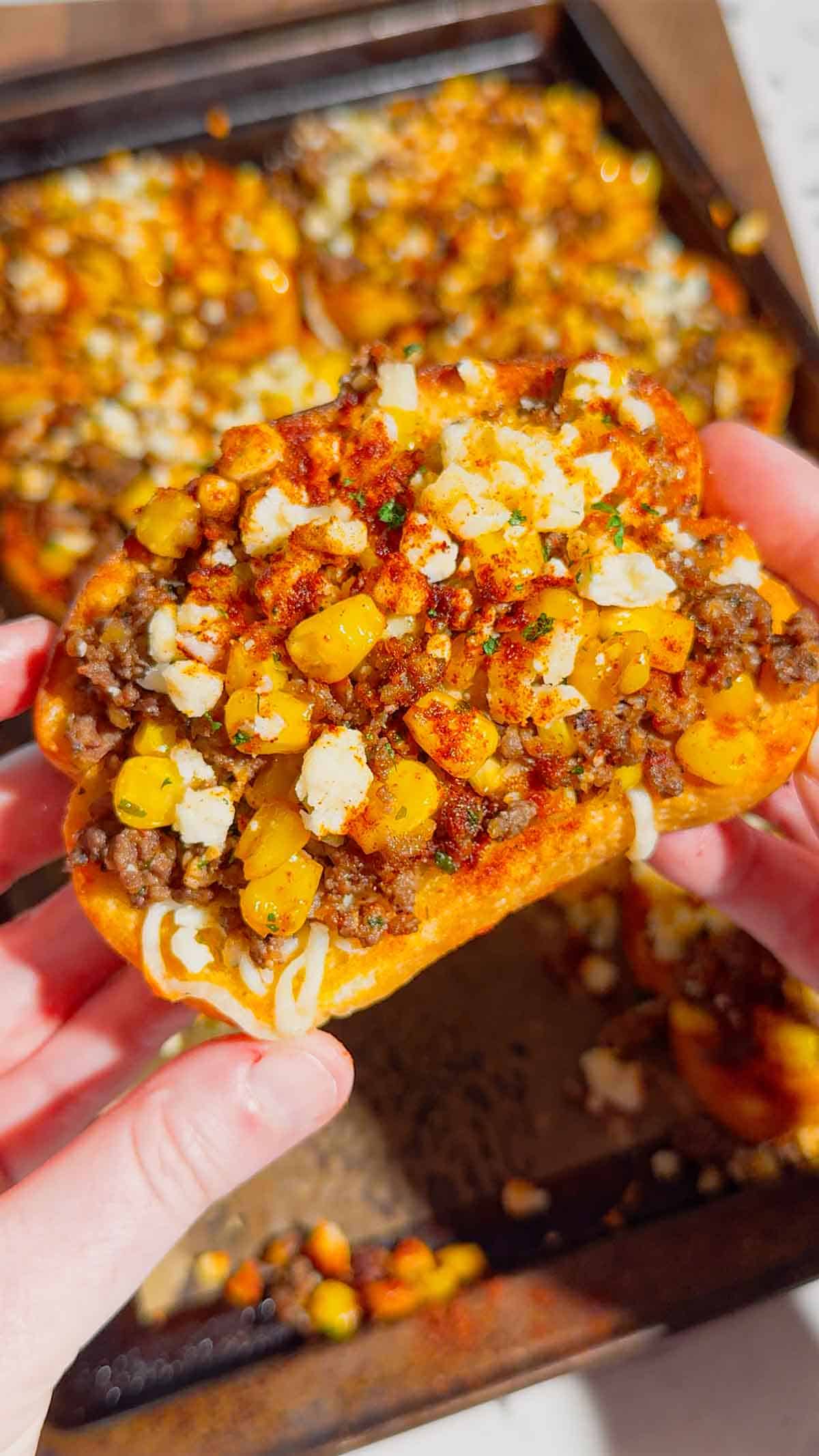 Need an easy dinner that's guaranteed to disappear fast? These Street Corn Beef Garlic Toasts combine crispy Texas garlic toast with seasoned ground beef, smoky street corn, melty mozzarella, tangy Cotija cheese, and a creamy lime sauce for the ultimate family meal. This easy ground beef recipe is perfect for busy weeknights, game day appetizers, party snacks, or quick comfort food dinners. If you're searching for easy dinner recipes, garlic bread recipes, ground beef dinner ideas, Texas toast recipes, Mexican-inspired recipes, street corn recipes, cheesy beef recipes, easy appetizer ideas, or family-friendly meals, this delicious recipe is packed with bold flavor, simple ingredients, and is ready in just 35 minutes. Save this recipe for your next easy weeknight dinner!