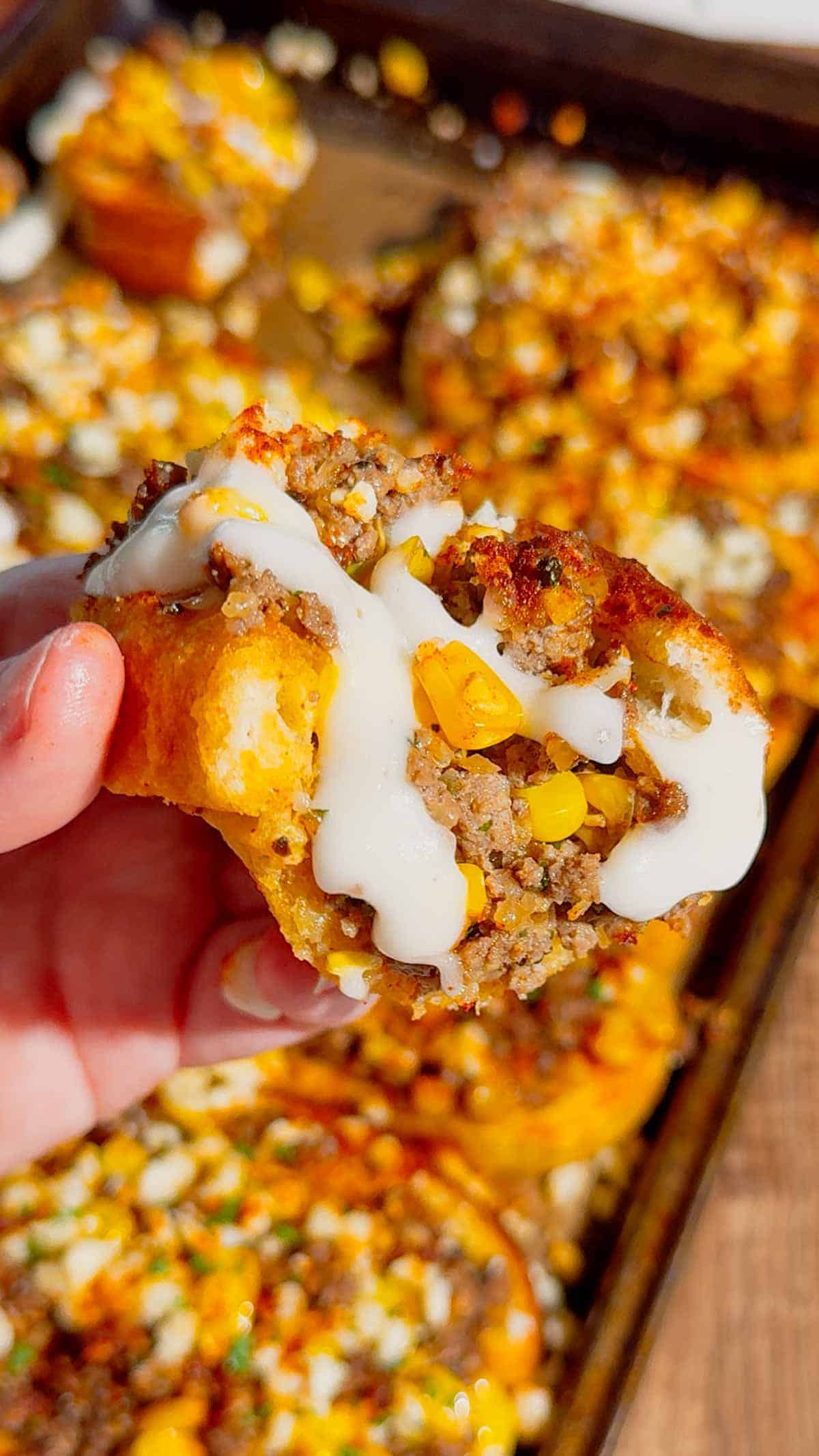 Need an easy dinner that's guaranteed to disappear fast? These Street Corn Beef Garlic Toasts combine crispy Texas garlic toast with seasoned ground beef, smoky street corn, melty mozzarella, tangy Cotija cheese, and a creamy lime sauce for the ultimate family meal. This easy ground beef recipe is perfect for busy weeknights, game day appetizers, party snacks, or quick comfort food dinners. If you're searching for easy dinner recipes, garlic bread recipes, ground beef dinner ideas, Texas toast recipes, Mexican-inspired recipes, street corn recipes, cheesy beef recipes, easy appetizer ideas, or family-friendly meals, this delicious recipe is packed with bold flavor, simple ingredients, and is ready in just 35 minutes. Save this recipe for your next easy weeknight dinner!