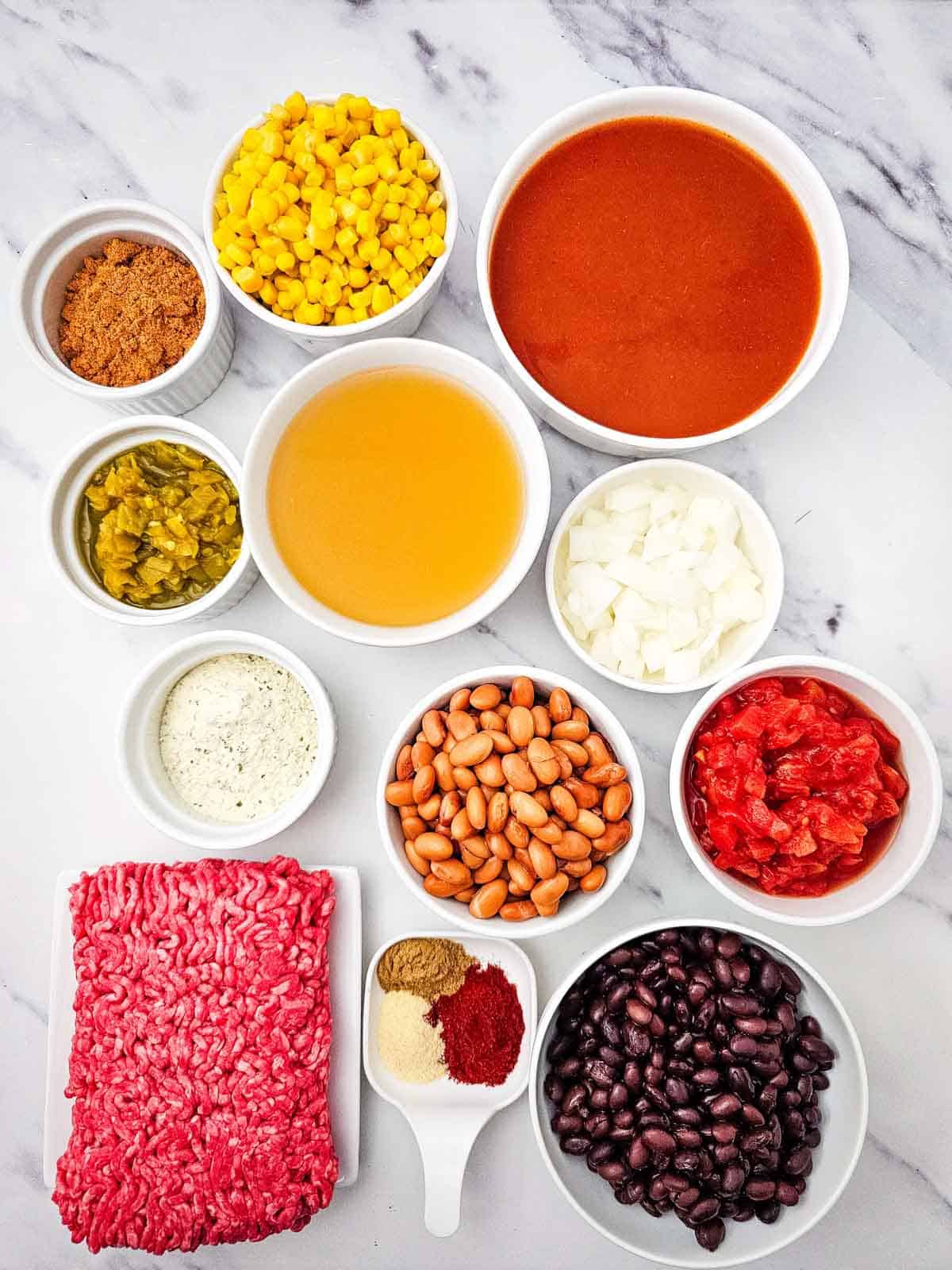 7 can taco soup ingredients on the kitchen counter