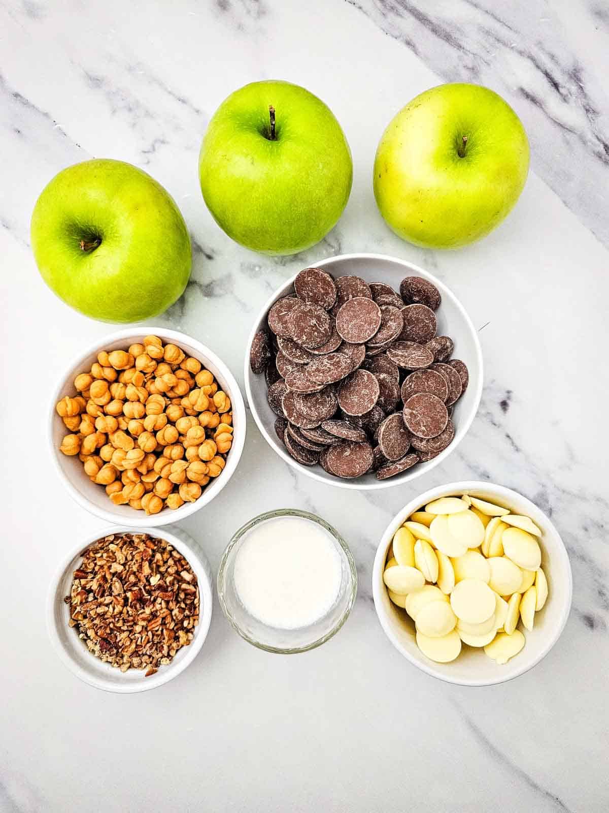 chocolate caramel apple slice ingredients on the kitchen counter