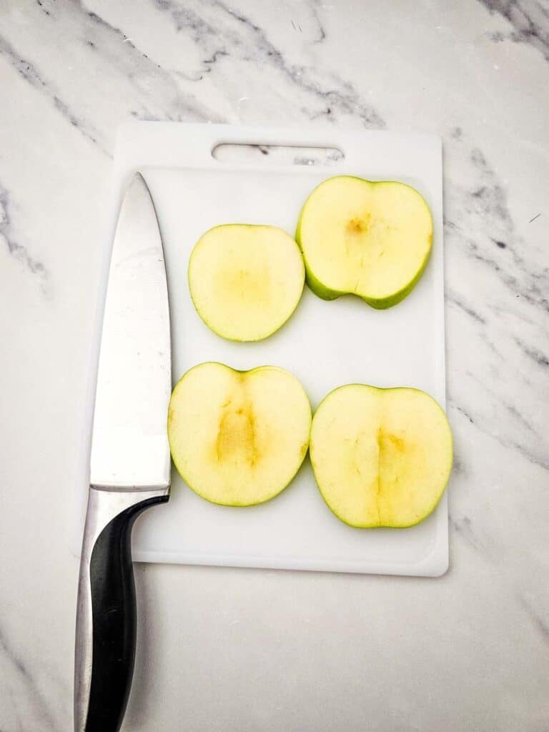 apple slices on a cutting board