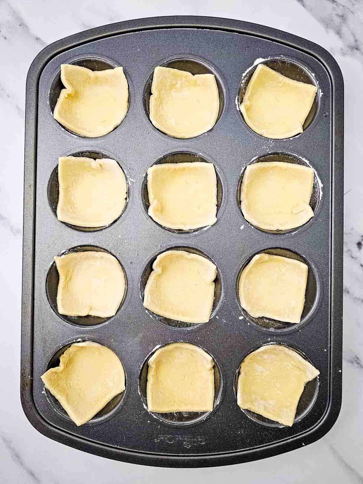 puff pastry lined muffin tins