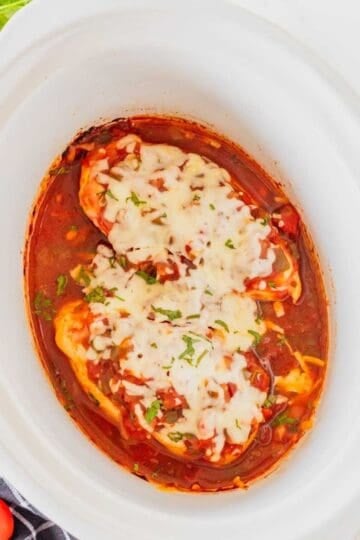 This Crockpot Chicken Salsa is an easy slow cooker dinner for busy weeknights! Tender chicken breasts cook low and slow with flavorful salsa, then get topped with melty Monterey Jack cheese for a simple meal the whole family will love. This easy salsa chicken recipe uses just a handful of ingredients and is perfect for tacos, burrito bowls, rice bowls, nachos, or serving with Mexican-inspired side dishes. If you love easy crockpot chicken recipes, slow cooker salsa chicken, dump and go dinners, simple chicken breast recipes, and family friendly meals, this one belongs on your menu. Customize it with spicy salsa, jalapeños, corn, peppers, avocado, sour cream, cilantro, or lime. Save this Crockpot Salsa Chicken recipe for an easy weeknight dinner, meal prep lunch, or fuss-free family meal!
