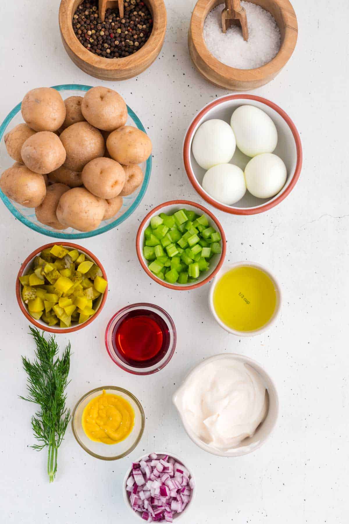dill pickle potato salad ingredients on the kitchen counter