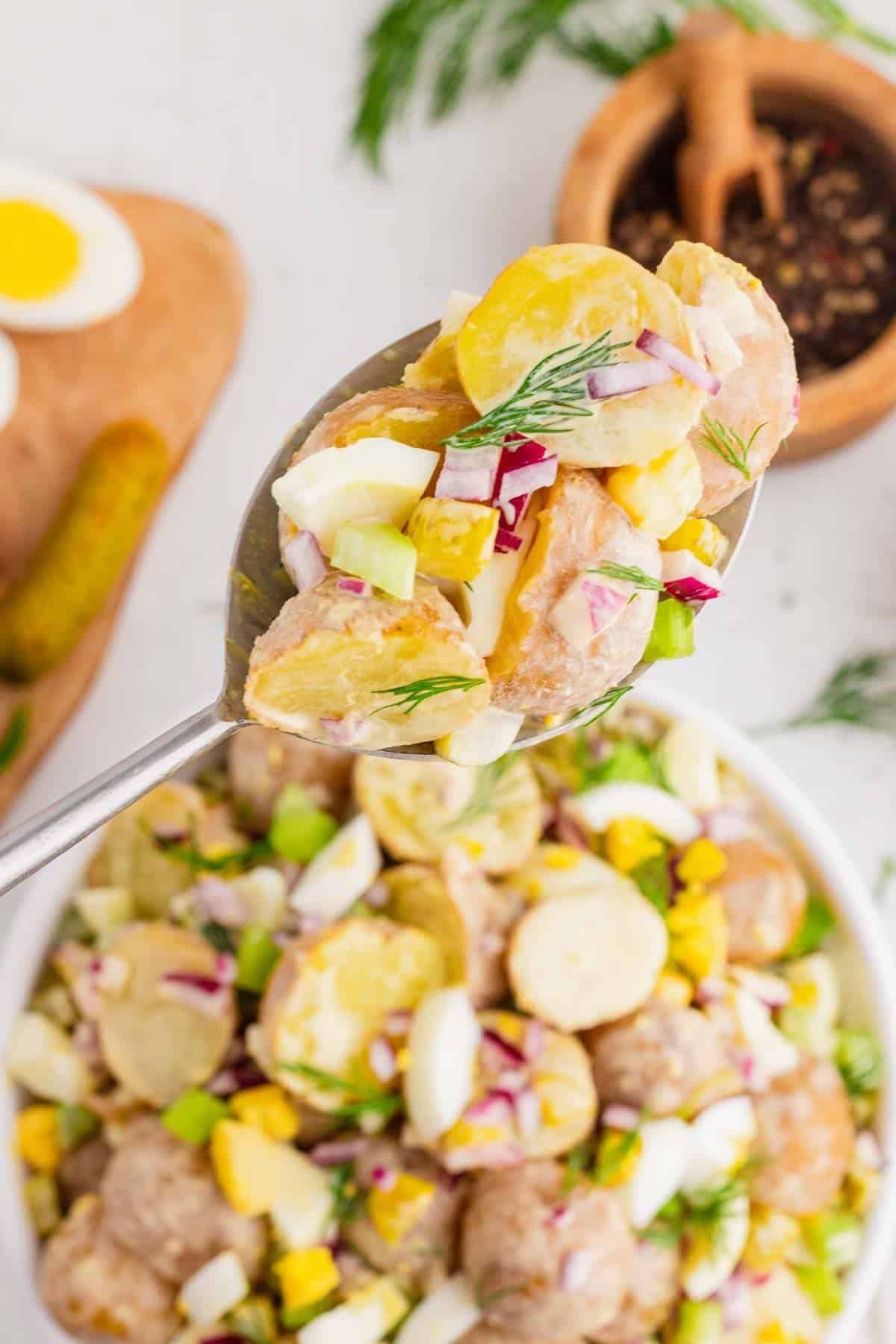 This Dill Pickle Potato Salad is the ultimate creamy and tangy summer side dish for pickle lovers! Tender baby potatoes are tossed with crunchy dill pickles, crisp celery, red onion, fresh dill, and chopped hard-boiled eggs for a flavor-packed twist on Classic Potato Salad. A creamy dressing made with mayonnaise, dill pickle juice, yellow mustard, and red wine vinegar gives this Easy Potato Salad Recipe plenty of zippy pickle flavor. Serve this Dill Pickle Potato Salad Recipe at summer BBQs, backyard cookouts, picnics, potlucks, family dinners, or holiday gatherings. If you're searching for Easy Summer Side Dishes, BBQ Side Dishes, Cold Potato Salad Recipes, Dill Pickle Recipes, Picnic Side Dishes, or the Best Potato Salad Recipe, save this creamy potato salad for later!