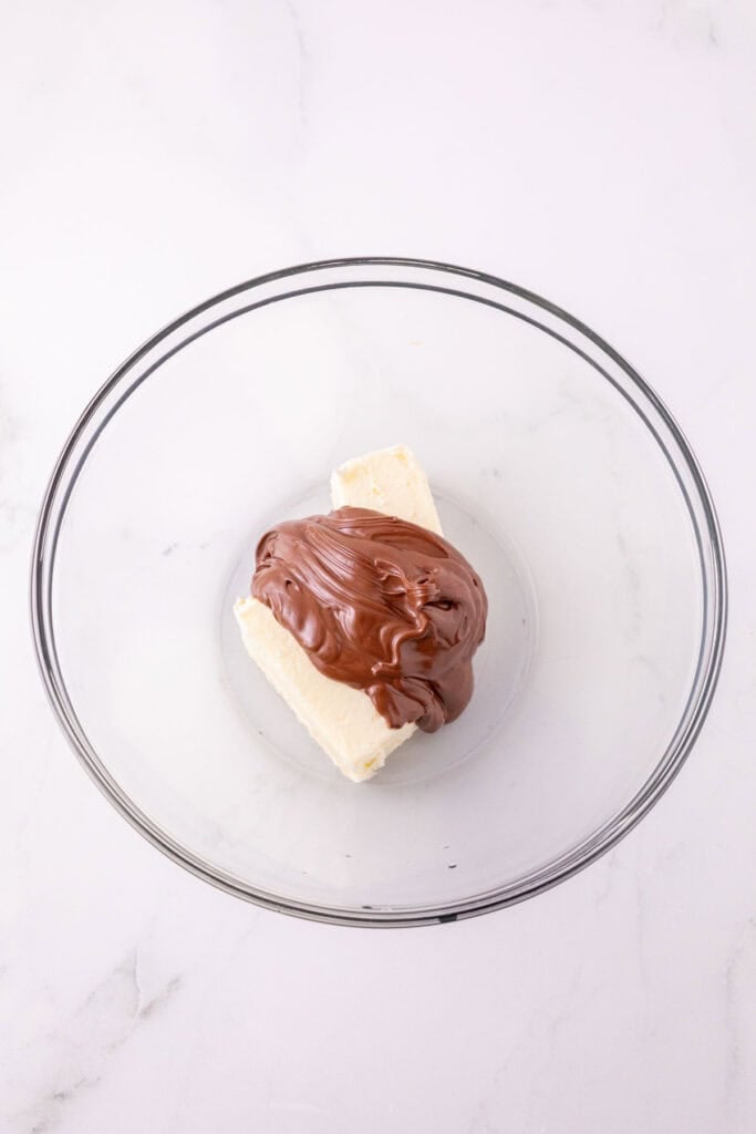 nutella on top of softened butter in a mixing bowl