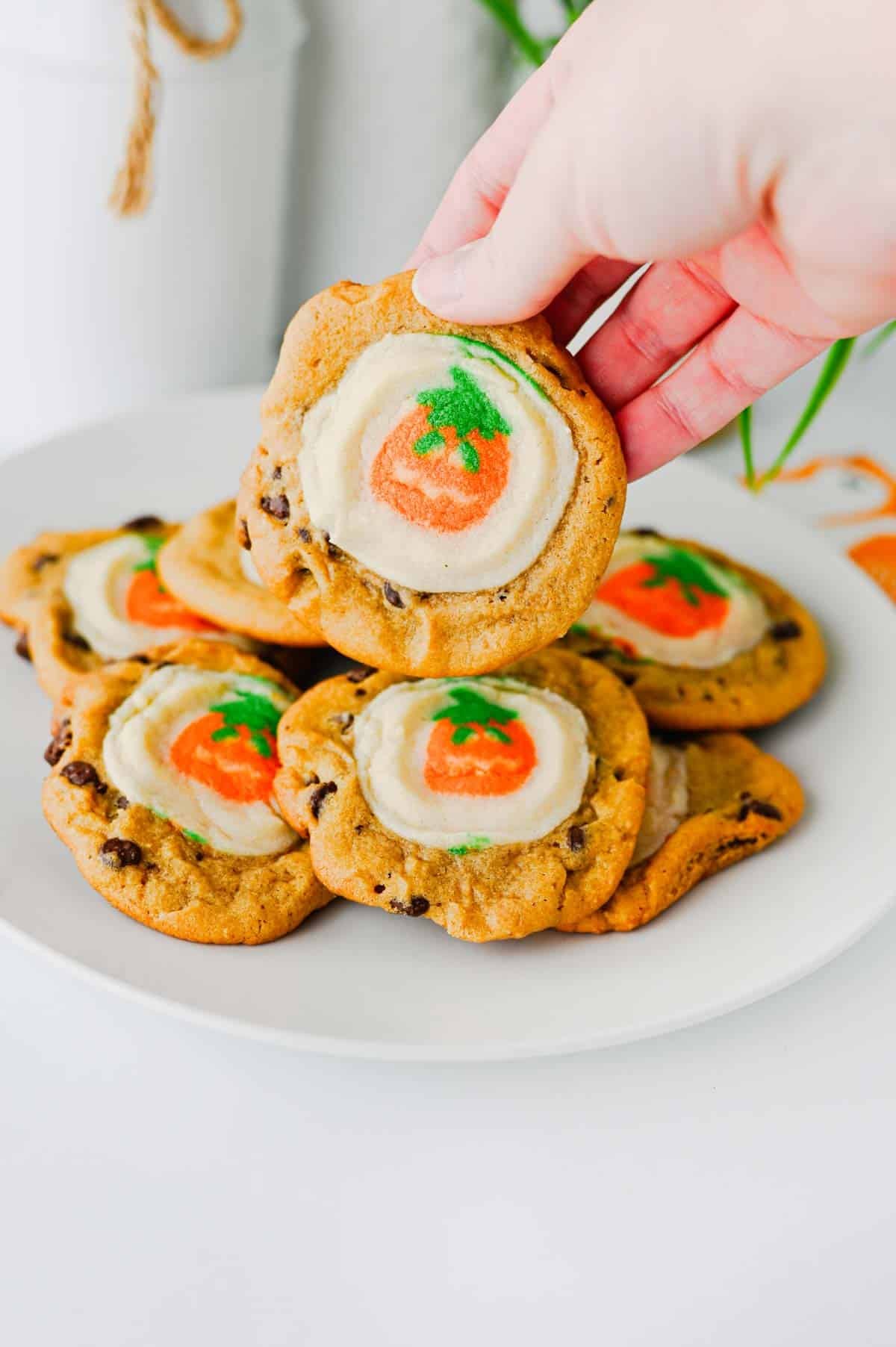 These Easy Halloween Cookies are the ultimate spooky season treat when you need something cute, festive, and incredibly simple! Made with just two ingredients, these Halloween cookies combine classic chocolate chip cookie dough with Pillsbury Pumpkin Shaped Cookies for an adorable two-in-one dessert. If you're searching for Easy Halloween Cookies, Halloween Cookie Ideas, Halloween Treats For Kids, Pillsbury Halloween Cookies, Easy Halloween Desserts, Fall Cookie Recipes, Pumpkin Cookies, or Halloween Party Food, you'll love this shortcut recipe. They bake in just 10 minutes and are perfect for Halloween parties, school treats, fall gatherings, movie nights, and October baking with kids. Save these easy Halloween cookies for a fun spooky treat everyone will love!