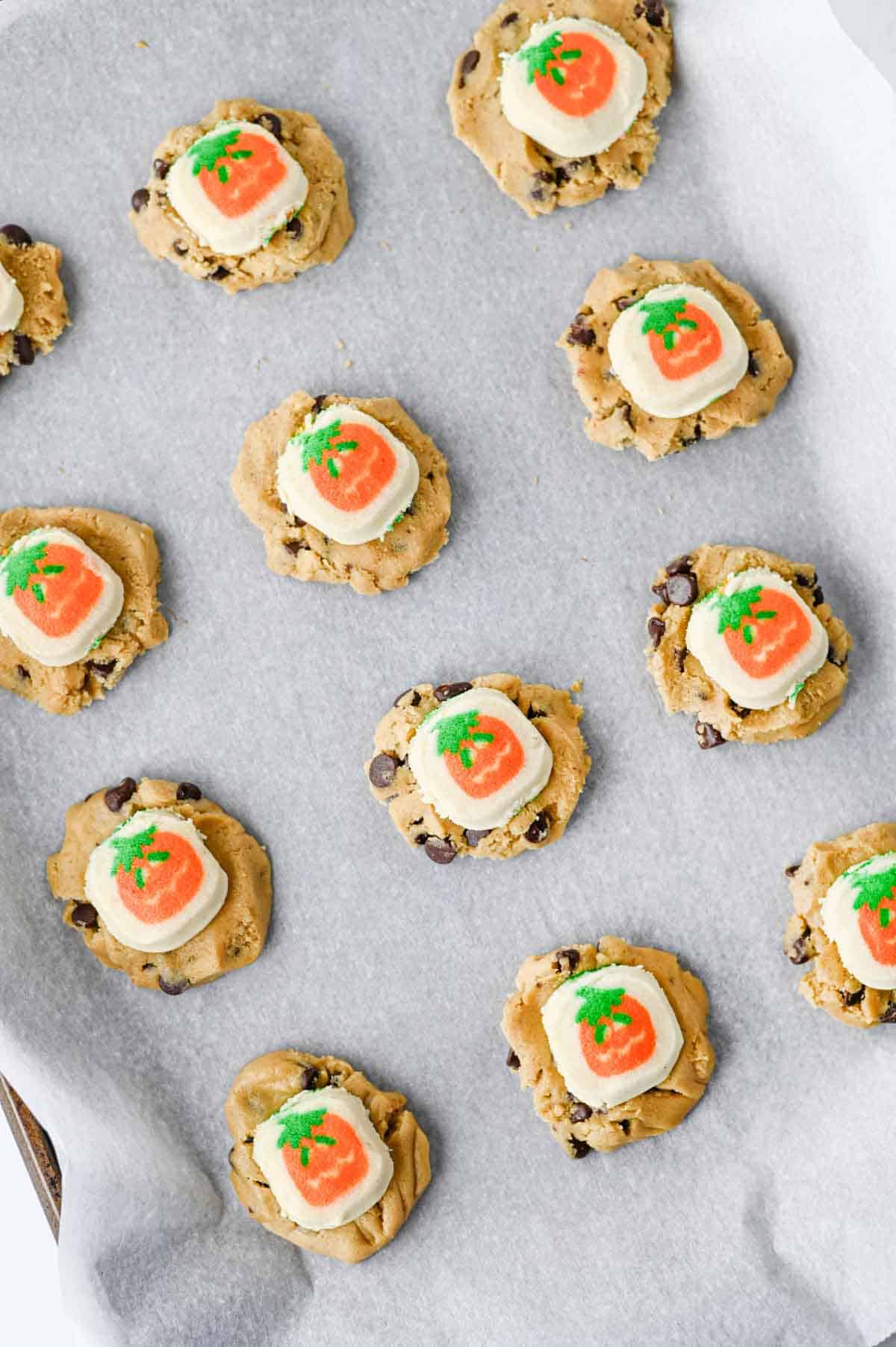 chocolate chip cookie dough topped with pillsbury pumpkin sugar cookies