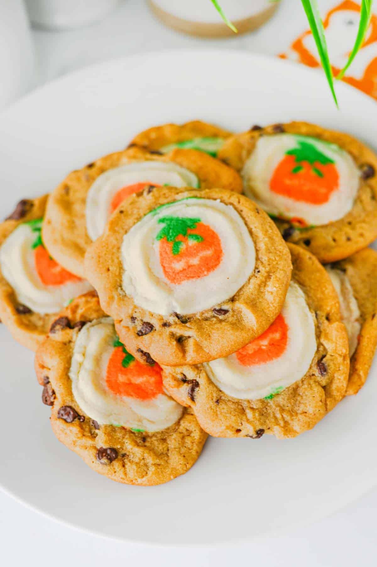 These Easy Halloween Cookies are the ultimate spooky season treat when you need something cute, festive, and incredibly simple! Made with just two ingredients, these Halloween cookies combine classic chocolate chip cookie dough with Pillsbury Pumpkin Shaped Cookies for an adorable two-in-one dessert. If you're searching for Easy Halloween Cookies, Halloween Cookie Ideas, Halloween Treats For Kids, Pillsbury Halloween Cookies, Easy Halloween Desserts, Fall Cookie Recipes, Pumpkin Cookies, or Halloween Party Food, you'll love this shortcut recipe. They bake in just 10 minutes and are perfect for Halloween parties, school treats, fall gatherings, movie nights, and October baking with kids. Save these easy Halloween cookies for a fun spooky treat everyone will love!