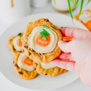 These Easy Halloween Cookies are the ultimate spooky season treat when you need something cute, festive, and incredibly simple! Made with just two ingredients, these Halloween cookies combine classic chocolate chip cookie dough with Pillsbury Pumpkin Shaped Cookies for an adorable two-in-one dessert. If you're searching for Easy Halloween Cookies, Halloween Cookie Ideas, Halloween Treats For Kids, Pillsbury Halloween Cookies, Easy Halloween Desserts, Fall Cookie Recipes, Pumpkin Cookies, or Halloween Party Food, you'll love this shortcut recipe. They bake in just 10 minutes and are perfect for Halloween parties, school treats, fall gatherings, movie nights, and October baking with kids. Save these easy Halloween cookies for a fun spooky treat everyone will love!