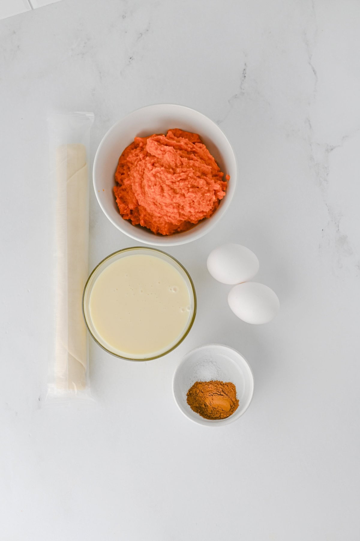 easy pumpkin pie ingredients on the kitchen counter