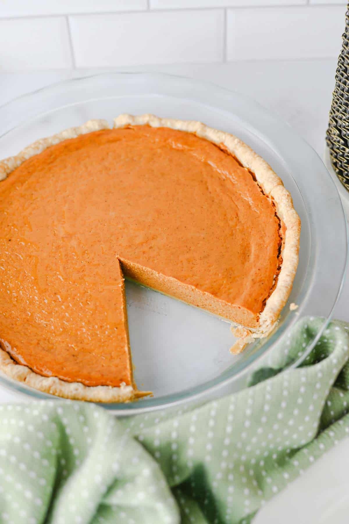 This Easy Pumpkin Pie Recipe is the perfect classic fall dessert for Thanksgiving, Christmas, or any cozy autumn gathering! Made with pumpkin puree, sweetened condensed milk, eggs, pumpkin pie spice, and a convenient store bought pie crust, this Homemade Pumpkin Pie is incredibly simple to prepare. If you're looking for Easy Pumpkin Desserts, Thanksgiving Pie Recipes, Pumpkin Puree Recipes, or Fall Baking Ideas, this creamy pie is a must-try. The smooth Pumpkin Pie Filling is warmly spiced and bakes up perfectly in a flaky golden crust. It's an Easy Thanksgiving Dessert that's great for beginner bakers and holiday entertaining. Save this Classic Pumpkin Pie Recipe for your Thanksgiving menu, fall baking list, or whenever you're craving an Easy Pumpkin Dessert that's rich, creamy, and full of pumpkin spice flavor!