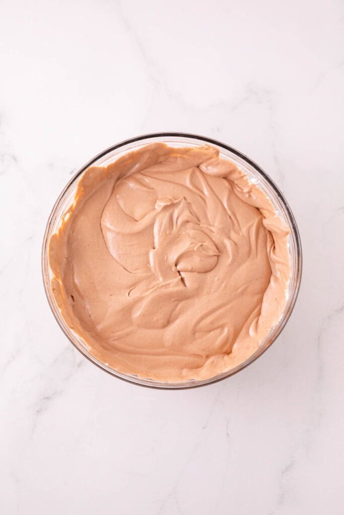 chocolate peanut butter pudding mixture in a mixing bowl