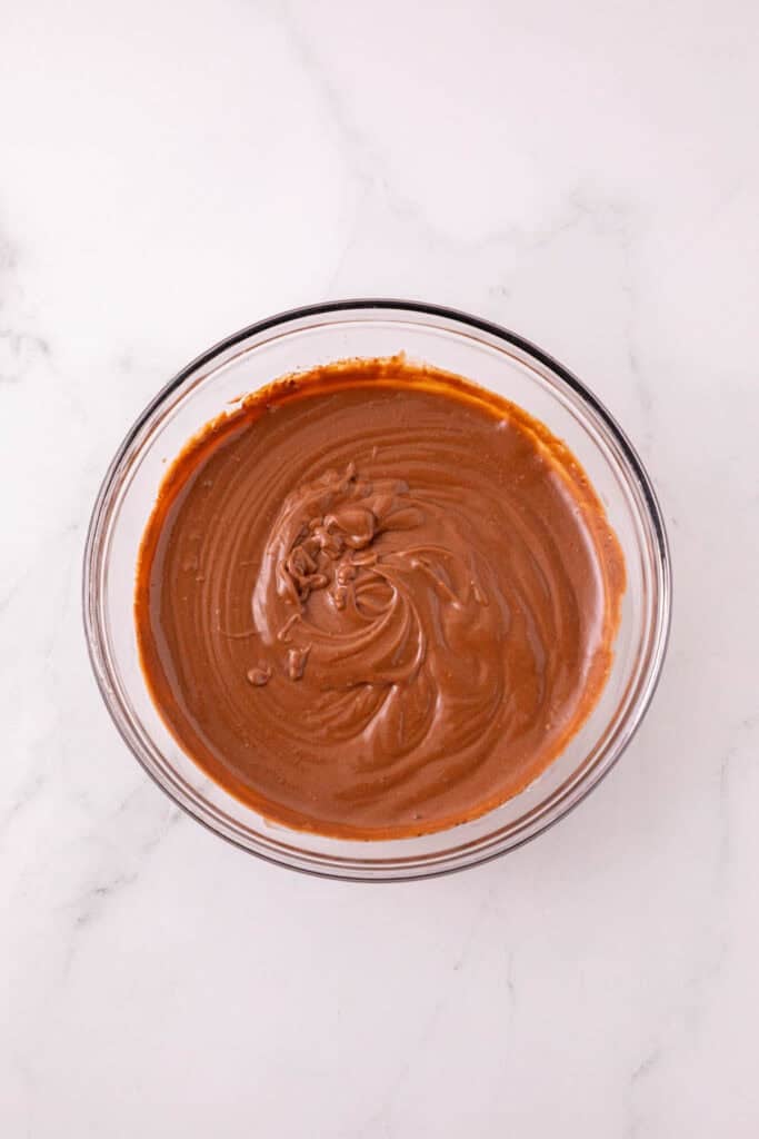 chocolate pudding in a glass mixing bowl
