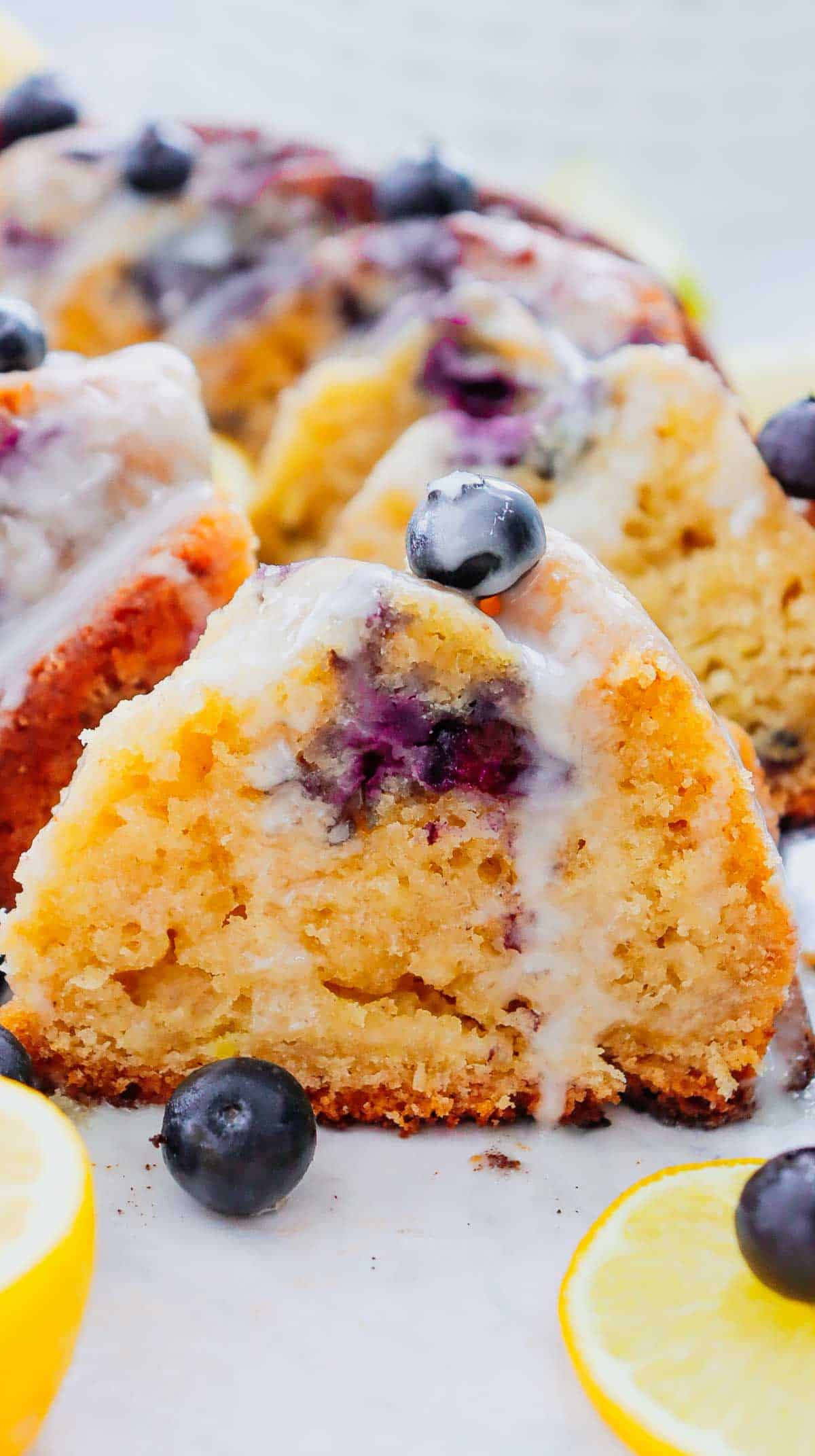 This Lemon Blueberry Bundt Cake is a moist, fluffy dessert bursting with juicy blueberries and fresh lemon flavor in every bite. If you’re searching for an Easy Lemon Blueberry Bundt Cake, Blueberry Lemon Cake, Lemon Bundt Cake Recipe, or Fresh Blueberry Dessert, this simple homemade cake is a must-try. Greek yogurt keeps the cake tender and moist while lemon zest adds the perfect bright citrus flavor. A sweet powdered sugar glaze finishes this beautiful Blueberry Bundt Cake and makes it perfect for spring baking, Easter dessert, Mother’s Day brunch, summer parties, potlucks, or afternoon coffee. Save this Lemon Blueberry Cake Recipe when you need Easy Bundt Cake Recipes, Lemon Desserts, Blueberry Desserts, Spring Cake Recipes, or a delicious dessert using fresh blueberries!