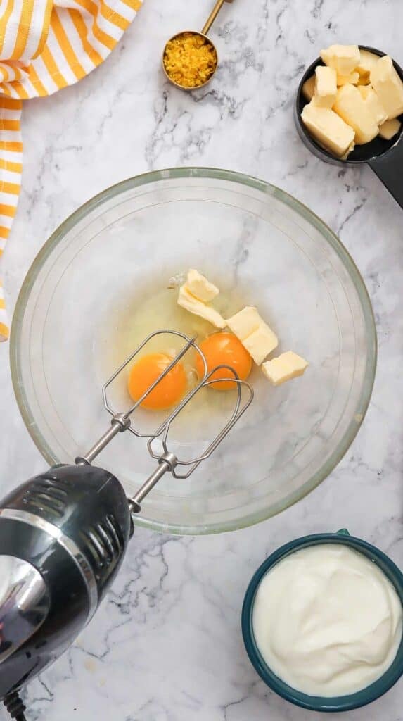 butter and eggs in a mixing bowl