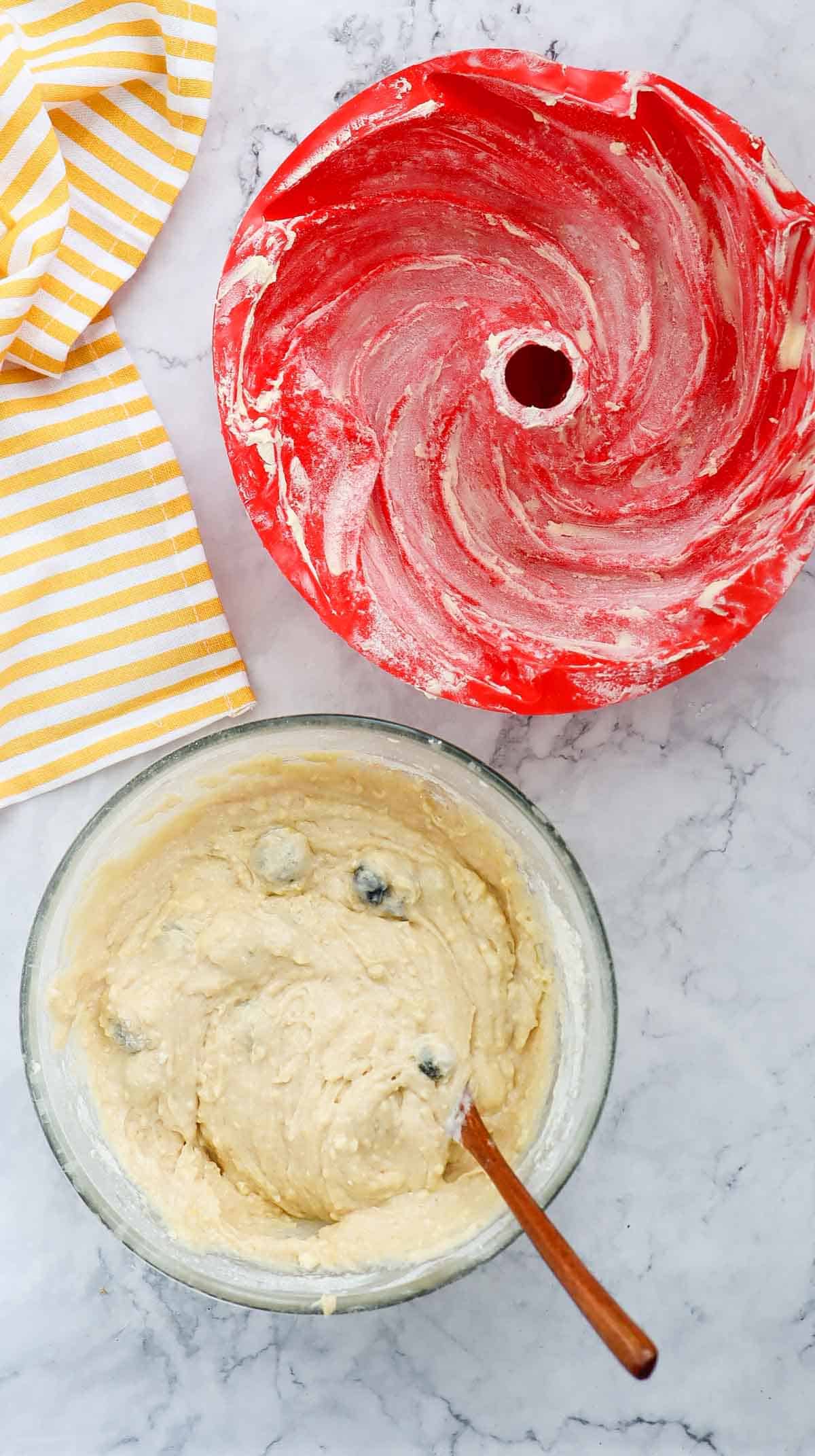 lemon blueberry cake batter in a mixng bowl
