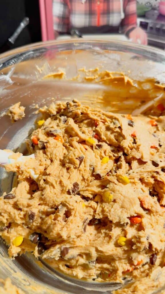 stirring loaded reese's dip mixture in abowl