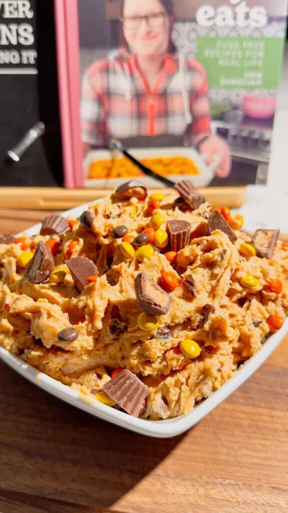 If you're looking for the ultimate Loaded Reese's Peanut Butter Dip, this easy no bake dessert is guaranteed to be a hit. Made with cream cheese, peanut butter, Cool Whip, brown sugar, Reese's Pieces, and chopped peanut butter cups, this creamy Peanut Butter Dip Recipe is rich, fluffy, and packed with chocolate and peanut butter flavor in every bite. It's the perfect Dessert Dip, Party Dip, No Bake Peanut Butter Dessert, and Reese's Dessert Recipe for game day, birthdays, potlucks, movie nights, holiday gatherings, or anytime you need a quick sweet treat. Serve it with graham crackers, pretzels, vanilla wafers, apple slices, or cookies for an irresistible snack everyone will keep coming back for. Save this easy peanut butter dessert recipe for your next party!