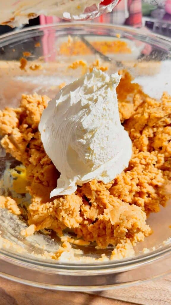 cool whip added to bowl with peanut butter cream cheese mixture