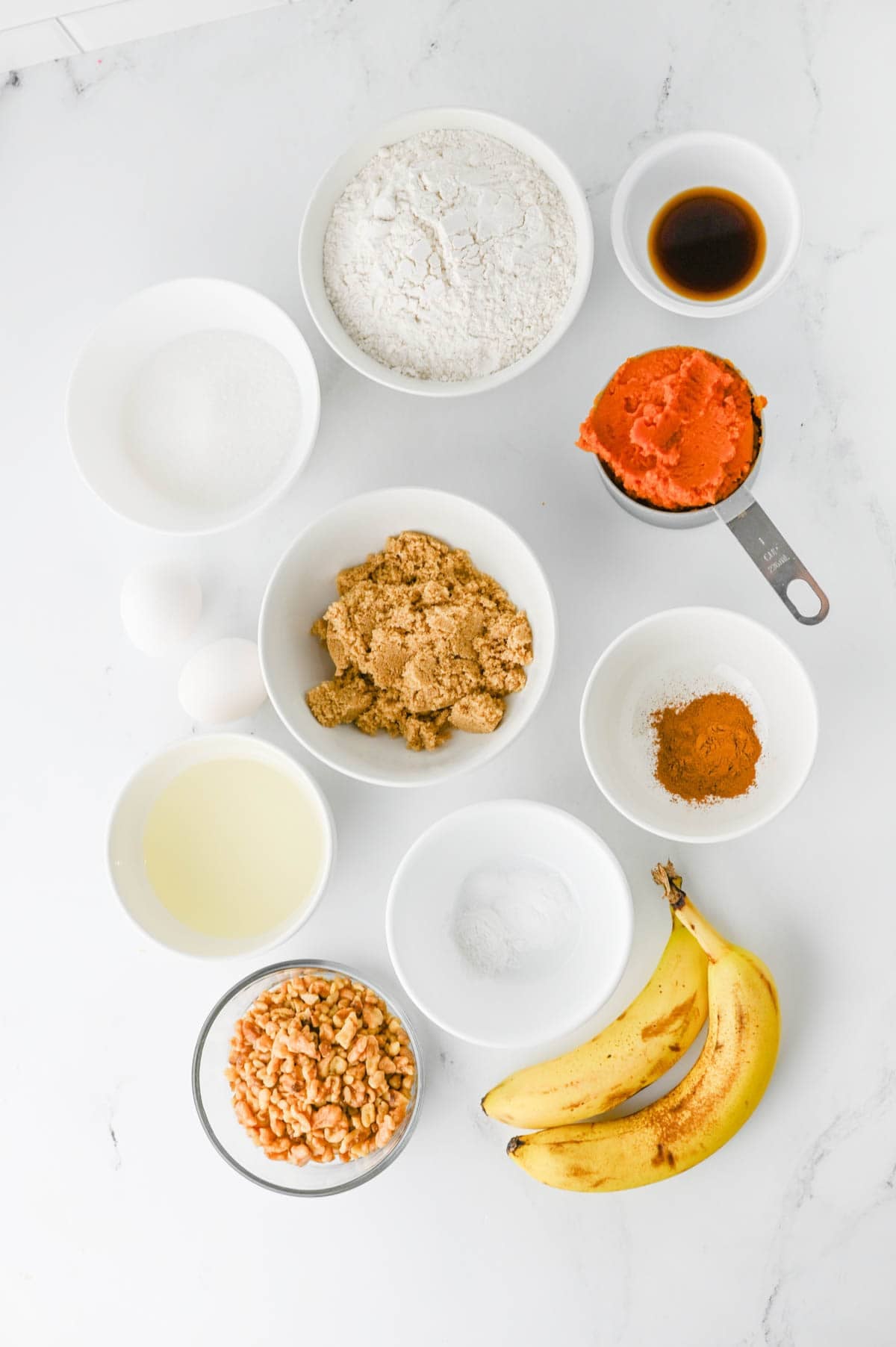 pumpkin banana bread ingredients on the kitchen counter