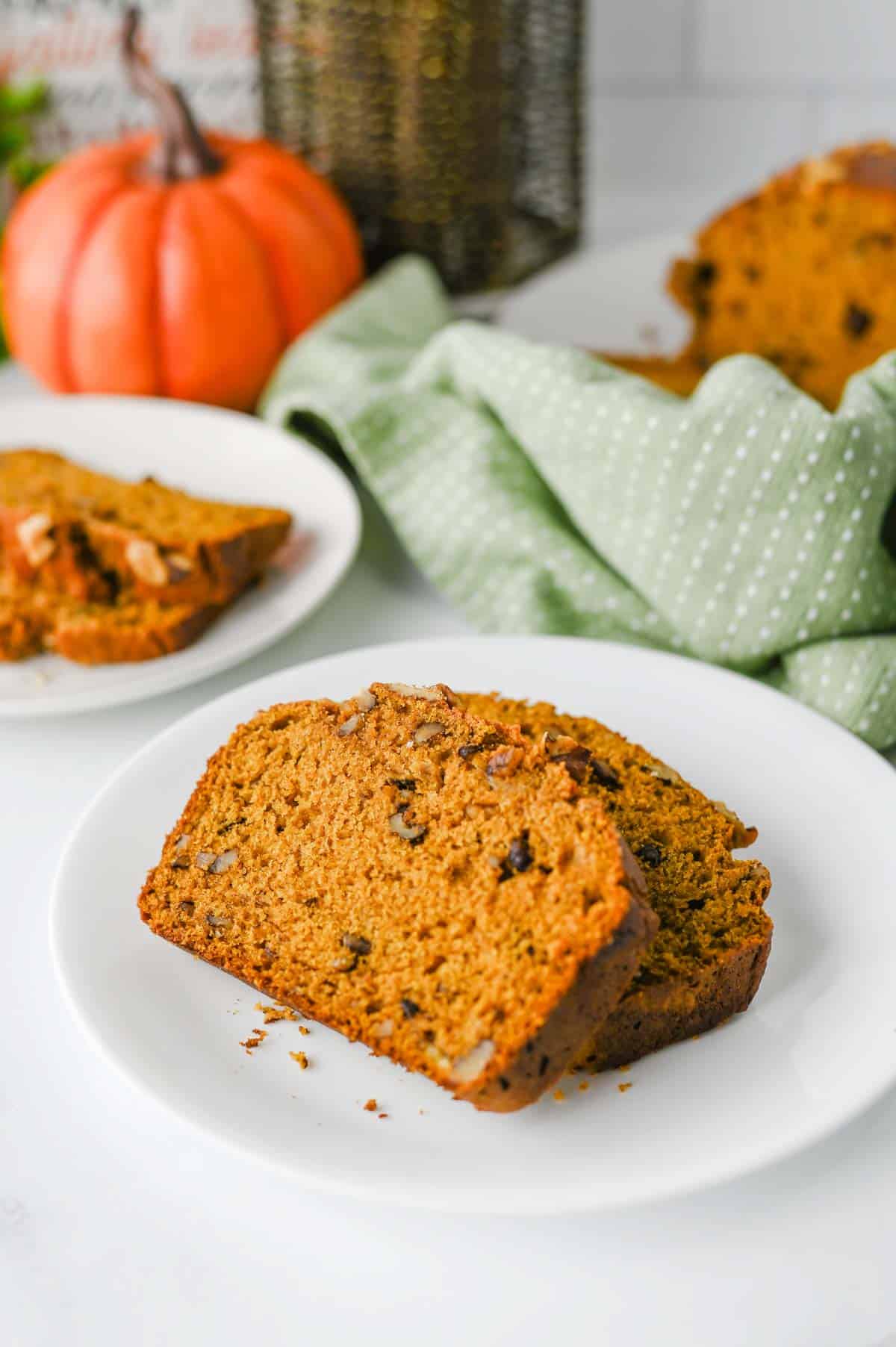 This Pumpkin Banana Bread is the ultimate cozy fall baking recipe, combining moist banana bread with pumpkin puree and warm pumpkin pie spice in one easy homemade loaf. If you love Pumpkin Bread Recipes, Banana Bread Recipes, Pumpkin Banana Bread Recipes, and Easy Fall Baking Recipes, this simple quick bread is a must-try. Ripe bananas and pumpkin puree keep every slice incredibly soft and moist, while brown sugar adds rich sweetness and chopped walnuts bring a delicious crunch. Serve this Easy Pumpkin Banana Bread for breakfast, brunch, dessert, or an afternoon snack with coffee. It's a delicious way to use Overripe Bananas and Canned Pumpkin and belongs on every list of Fall Bread Recipes, Pumpkin Recipes, Fall Desserts, Autumn Baking Ideas, and Cozy Fall Recipes.