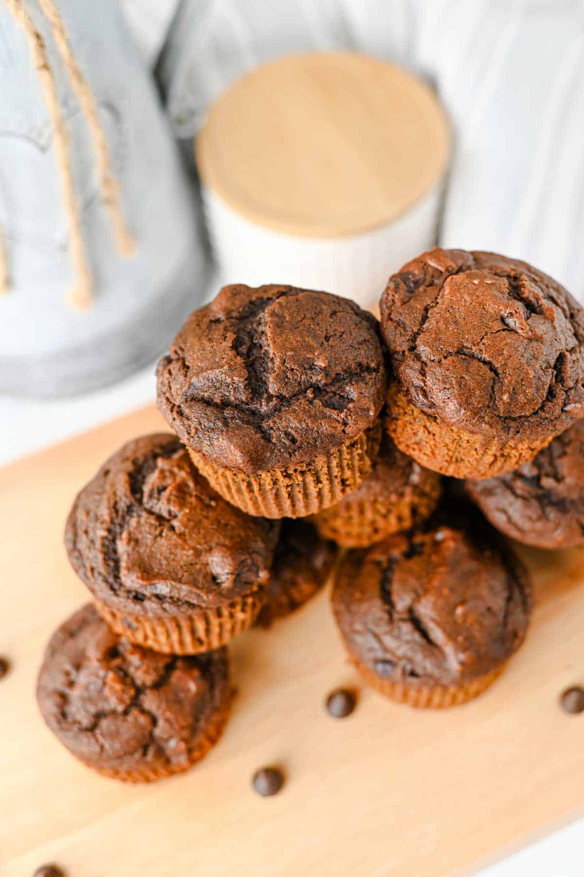 These Pumpkin Chocolate Muffins are the ultimate cozy treat for fall baking! Made with pumpkin puree, cocoa powder, sour cream, and plenty of semi sweet chocolate chips, these moist Pumpkin Chocolate Chip Muffins are rich, fluffy, and loaded with chocolate in every bite. If you love Easy Pumpkin Recipes, Chocolate Pumpkin Muffins, Pumpkin Recipes Dessert ideas, and homemade Fall Muffins, this recipe belongs on your baking list. They're perfect for breakfast, dessert, lunchboxes, after-school snacks, or Thanksgiving morning. Add these easy Pumpkin Muffins to your favorite Fall Baking Recipes, Pumpkin Chocolate Recipes, Fall Dessert Ideas, and Pumpkin Baking Ideas. These moist Chocolate Chip Pumpkin Muffins are simple to make and ready in under 40 minutes for an easy autumn treat the whole family will love!