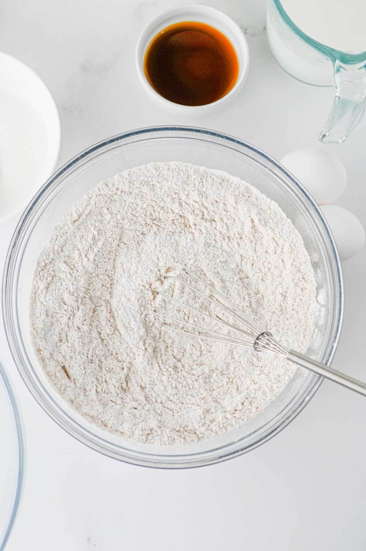 pumpkin pancake dry ingredients in a large glass mixing bowl