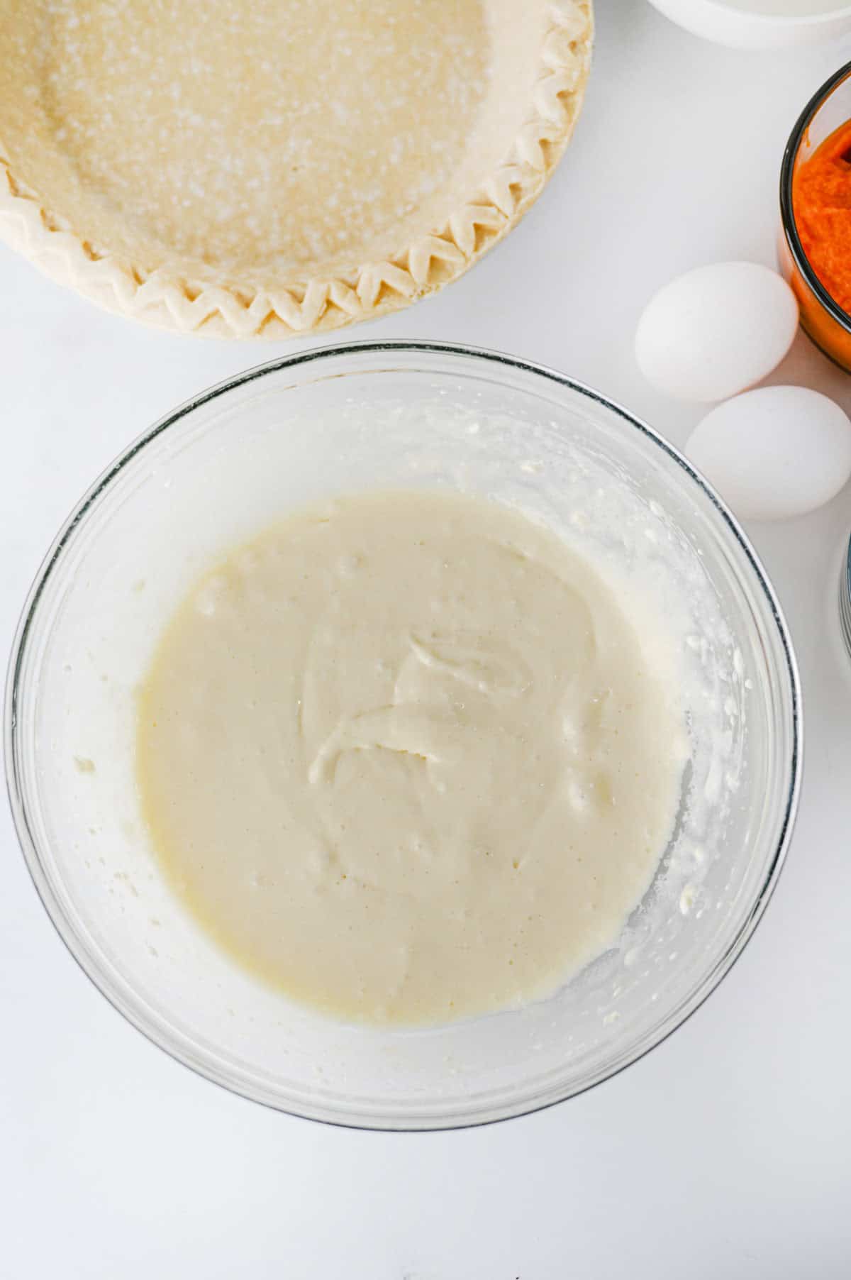cheesecake mixture in a mixing bowl