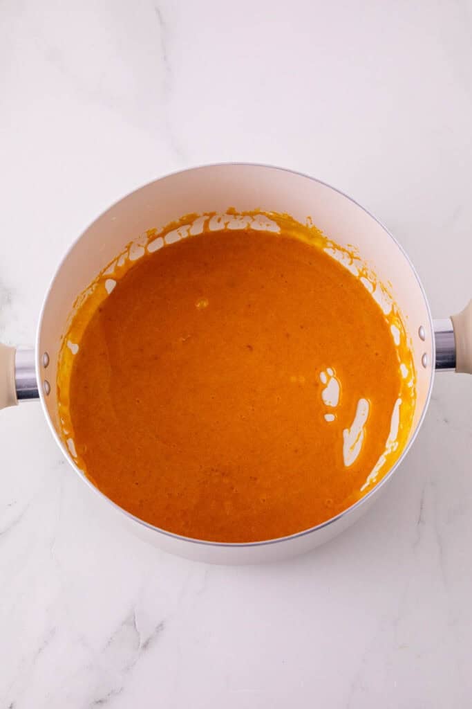 pumpkin puree rice krispie mixture in a saucepan