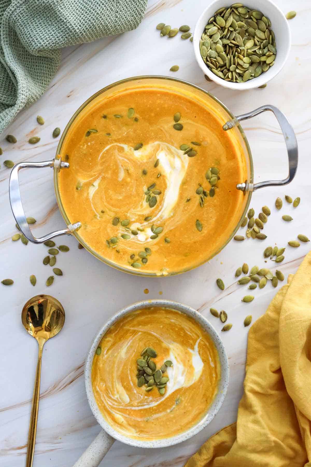 This Creamy Pumpkin Soup is the ultimate cozy fall comfort food! Made with smooth pumpkin puree, onion, garlic, warm ginger, cumin, nutmeg, flavorful broth, and rich heavy cream, this Easy Pumpkin Soup Recipe is ready in just 40 minutes. If you’re searching for Pumpkin Soup Recipes, Fall Soup Recipes, Creamy Soup Recipes, or easy Pumpkin Recipes for dinner, this simple homemade soup is a must-try. Serve this Creamy Pumpkin Soup with crusty bread, croutons, toasted pumpkin seeds, or a swirl of cream for a comforting meal. It’s perfect for chilly fall nights, Thanksgiving dinner, holiday lunches, or an easy weeknight meal. Save this Pumpkin Soup Recipe for your fall meal planning, and enjoy a warm bowl of creamy, savory pumpkin goodness all season long!