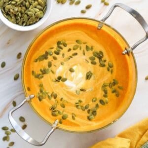 This Creamy Pumpkin Soup is the ultimate cozy fall comfort food! Made with smooth pumpkin puree, onion, garlic, warm ginger, cumin, nutmeg, flavorful broth, and rich heavy cream, this Easy Pumpkin Soup Recipe is ready in just 40 minutes. If you’re searching for Pumpkin Soup Recipes, Fall Soup Recipes, Creamy Soup Recipes, or easy Pumpkin Recipes for dinner, this simple homemade soup is a must-try. Serve this Creamy Pumpkin Soup with crusty bread, croutons, toasted pumpkin seeds, or a swirl of cream for a comforting meal. It’s perfect for chilly fall nights, Thanksgiving dinner, holiday lunches, or an easy weeknight meal. Save this Pumpkin Soup Recipe for your fall meal planning, and enjoy a warm bowl of creamy, savory pumpkin goodness all season long!