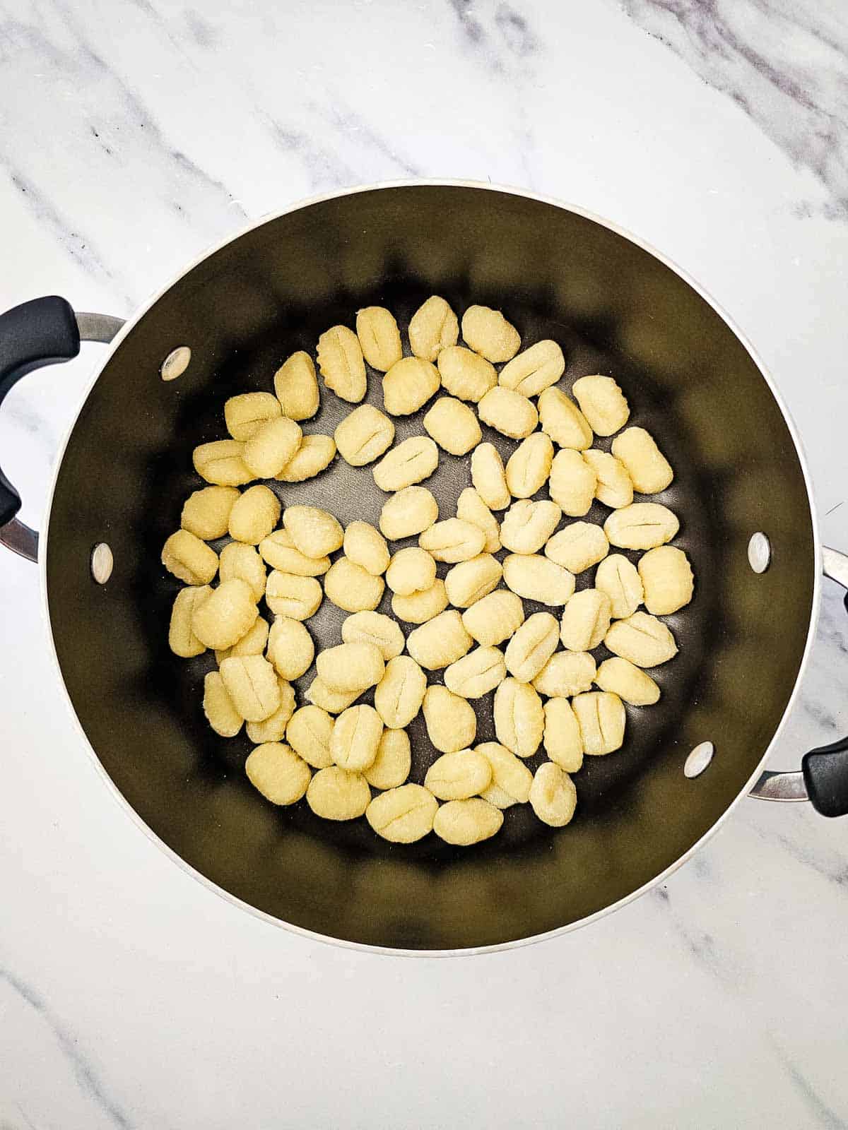potato gnocchi in a skillet