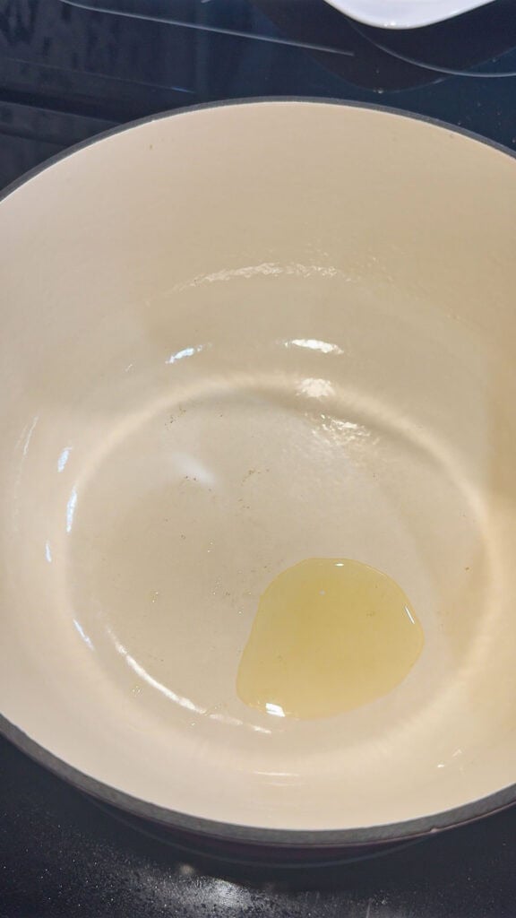 olive oil heating in a pot