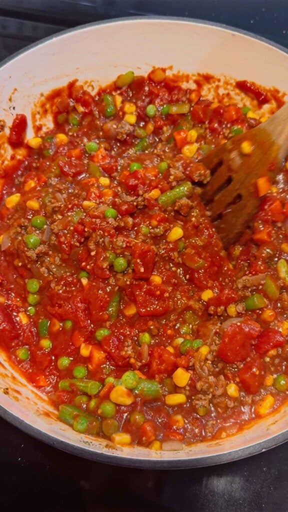 beef vegetable soup mixture in a large pot