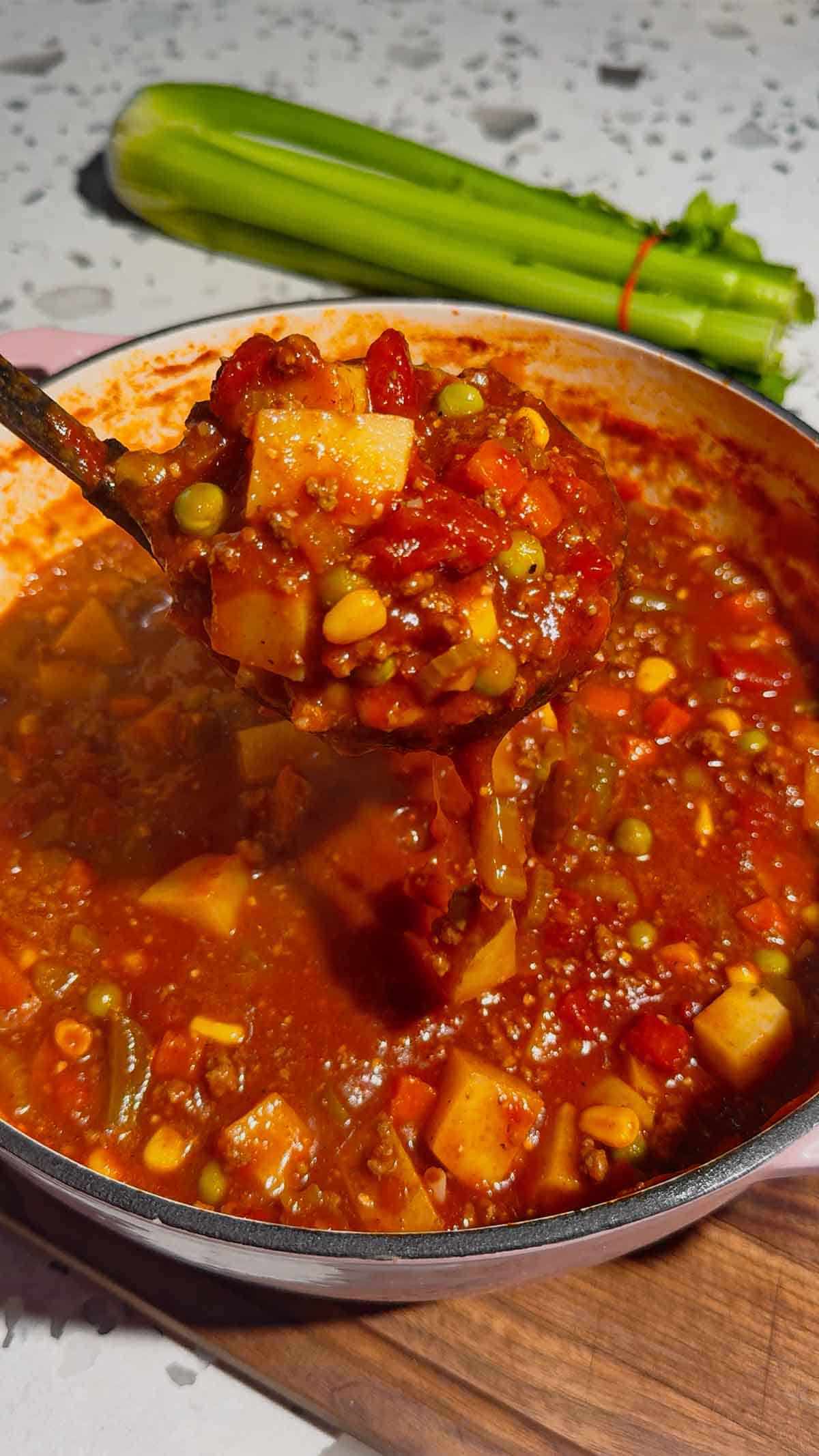 This Beef Vegetable Soup is an easy one-pot dinner loaded with seasoned ground beef, tender russet potatoes, diced tomatoes, celery, onions and colourful mixed vegetables in a rich tomato and beef broth. Ready in just 45 minutes, this hearty homemade soup is perfect for busy weeknights, chilly fall evenings and cozy winter dinners. Save this easy beef soup recipe when you need simple ground beef dinner ideas, comforting soup recipes, budget-friendly family meals or a quick way to use frozen vegetables. It’s a delicious vegetable beef soup for meal prep, freezer meals, cold-weather lunches and satisfying dinners the whole family will enjoy. Serve it with crusty bread, warm dinner rolls or crackers for an easy comfort food meal packed with meat, potatoes and vegetables.