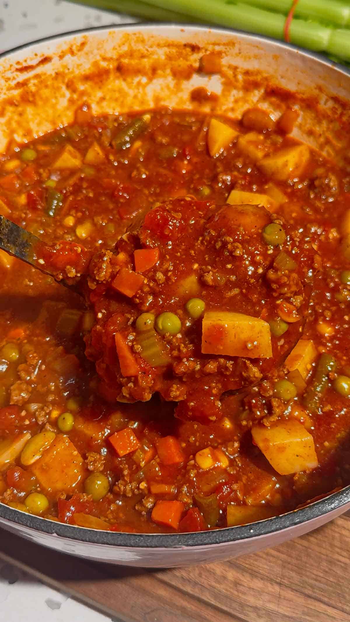 This Beef Vegetable Soup is an easy one-pot dinner loaded with seasoned ground beef, tender russet potatoes, diced tomatoes, celery, onions and colourful mixed vegetables in a rich tomato and beef broth. Ready in just 45 minutes, this hearty homemade soup is perfect for busy weeknights, chilly fall evenings and cozy winter dinners. Save this easy beef soup recipe when you need simple ground beef dinner ideas, comforting soup recipes, budget-friendly family meals or a quick way to use frozen vegetables. It’s a delicious vegetable beef soup for meal prep, freezer meals, cold-weather lunches and satisfying dinners the whole family will enjoy. Serve it with crusty bread, warm dinner rolls or crackers for an easy comfort food meal packed with meat, potatoes and vegetables.
