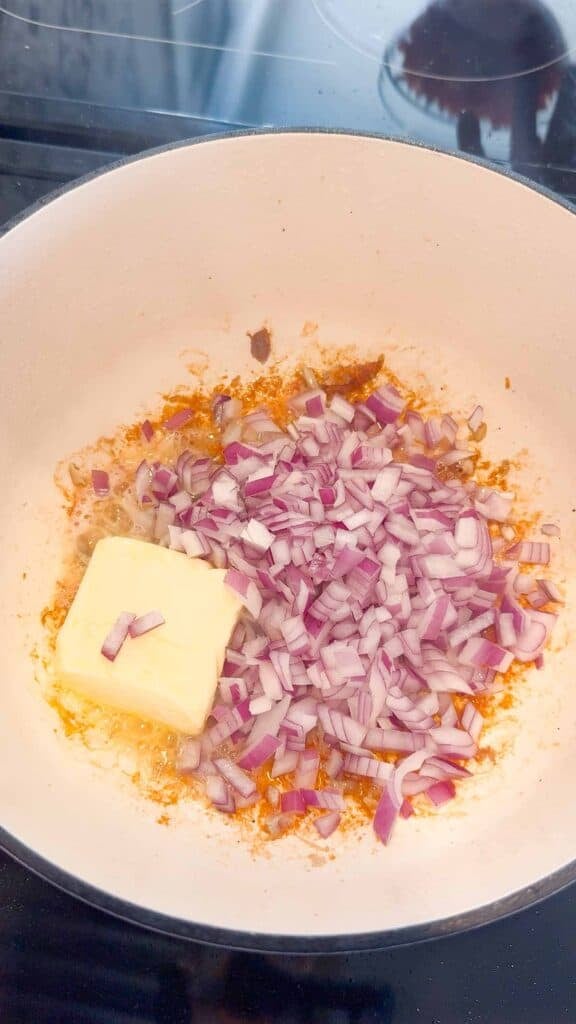 diced red onions added to pot with butter